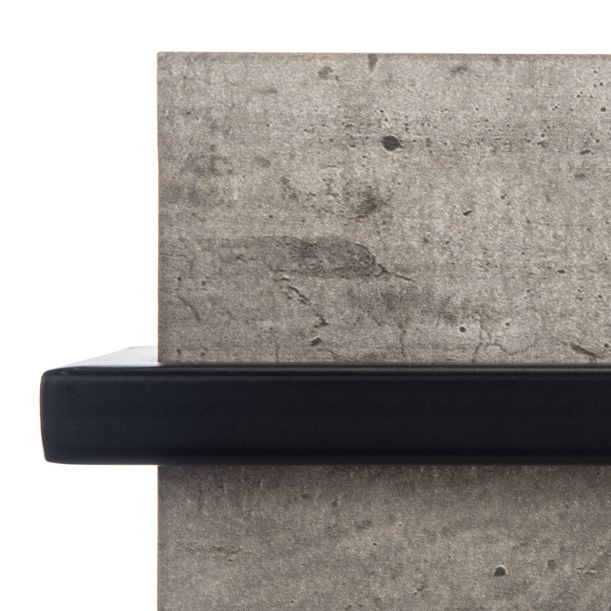 A clean black iron bar crosses the textured gray tabletop edge for graphic contrast.
