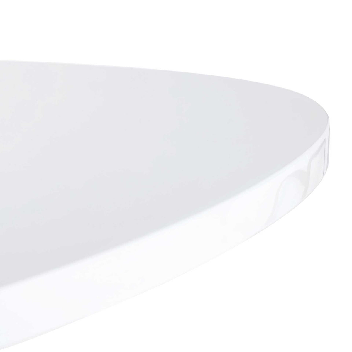 Glossy white lacquer coats the softly rounded tabletop edge.