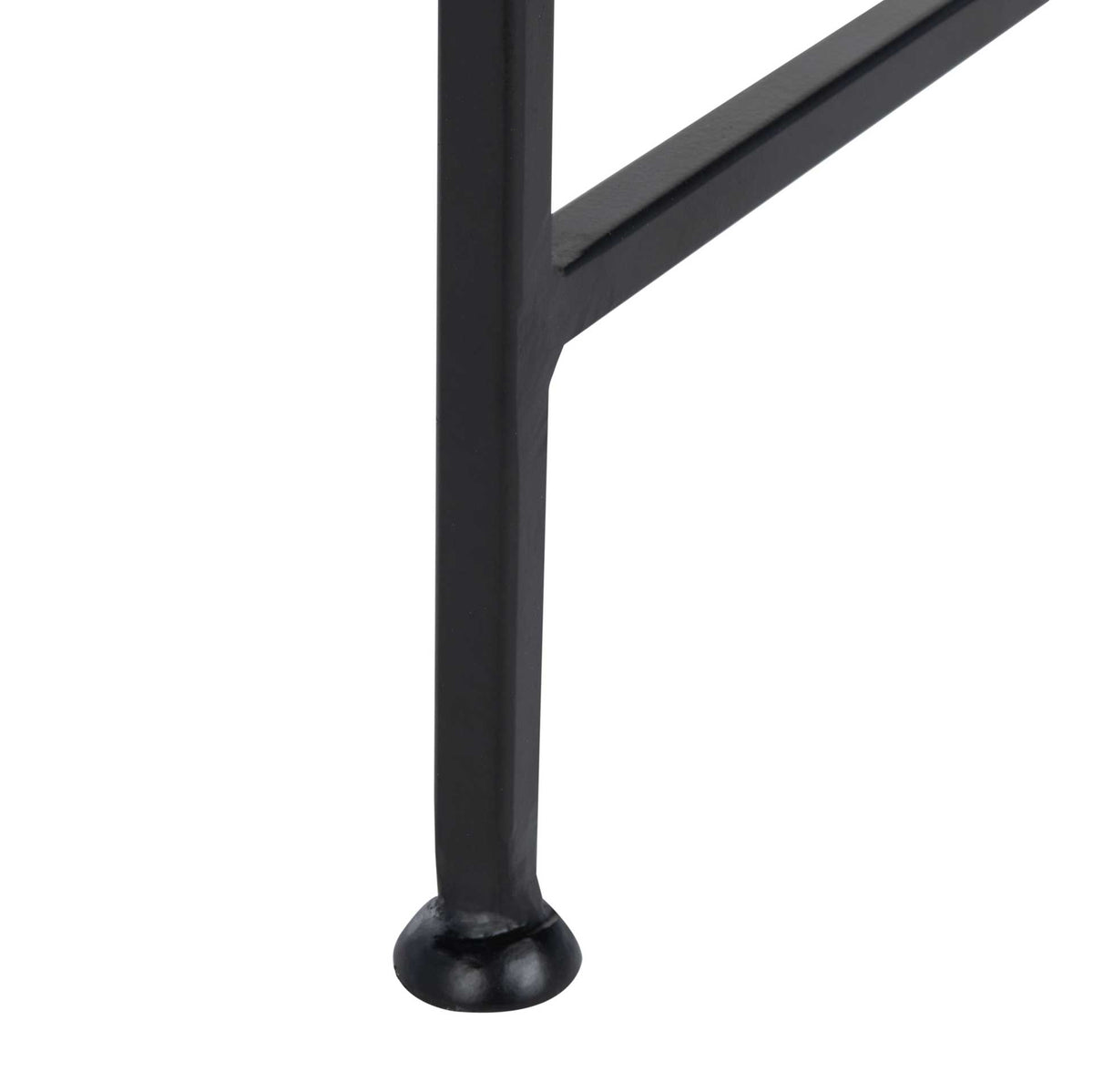 A slender black metal leg joins an angled crossbar above a rounded foot.