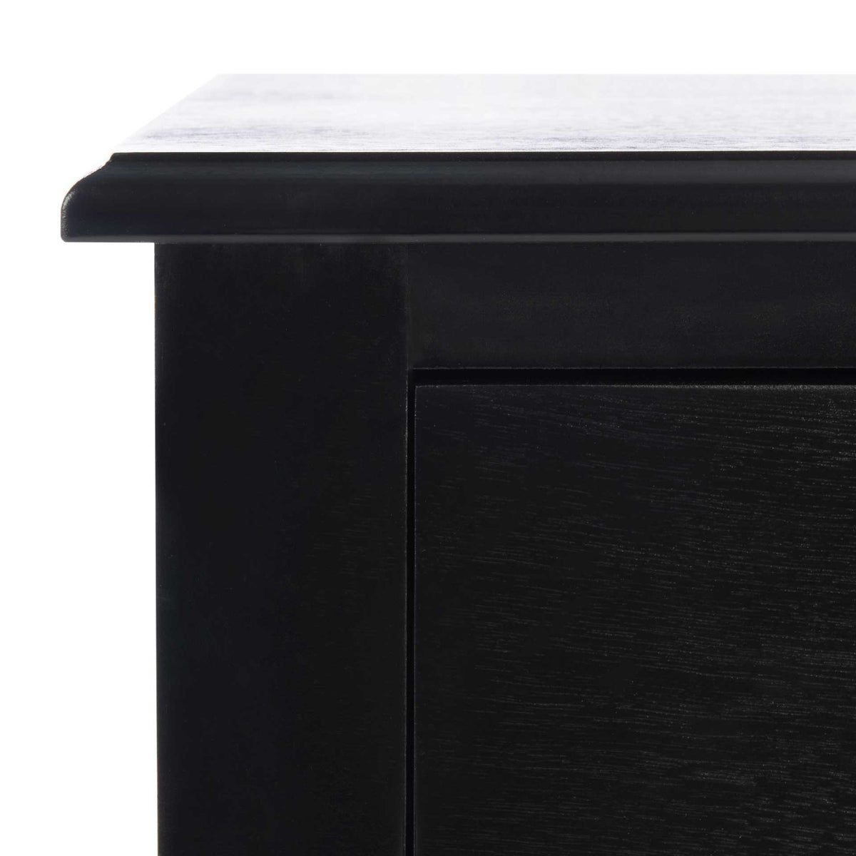 Softly rounded tabletop trim and subtle wood grain refine the black drawer frame