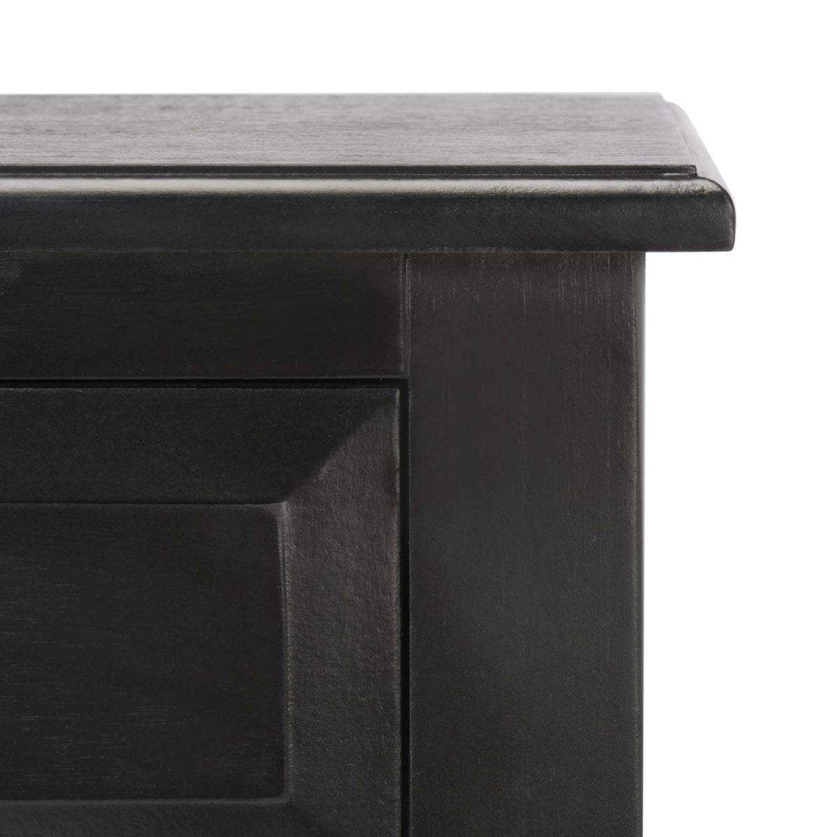 Black wood finish highlights the molded tabletop edge and framed drawer front