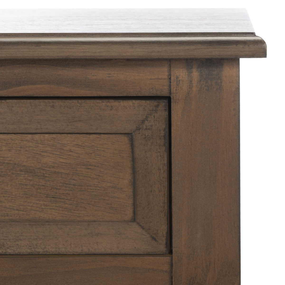 Rich brown wood grain and a softly molded tabletop edge frame the inset drawer