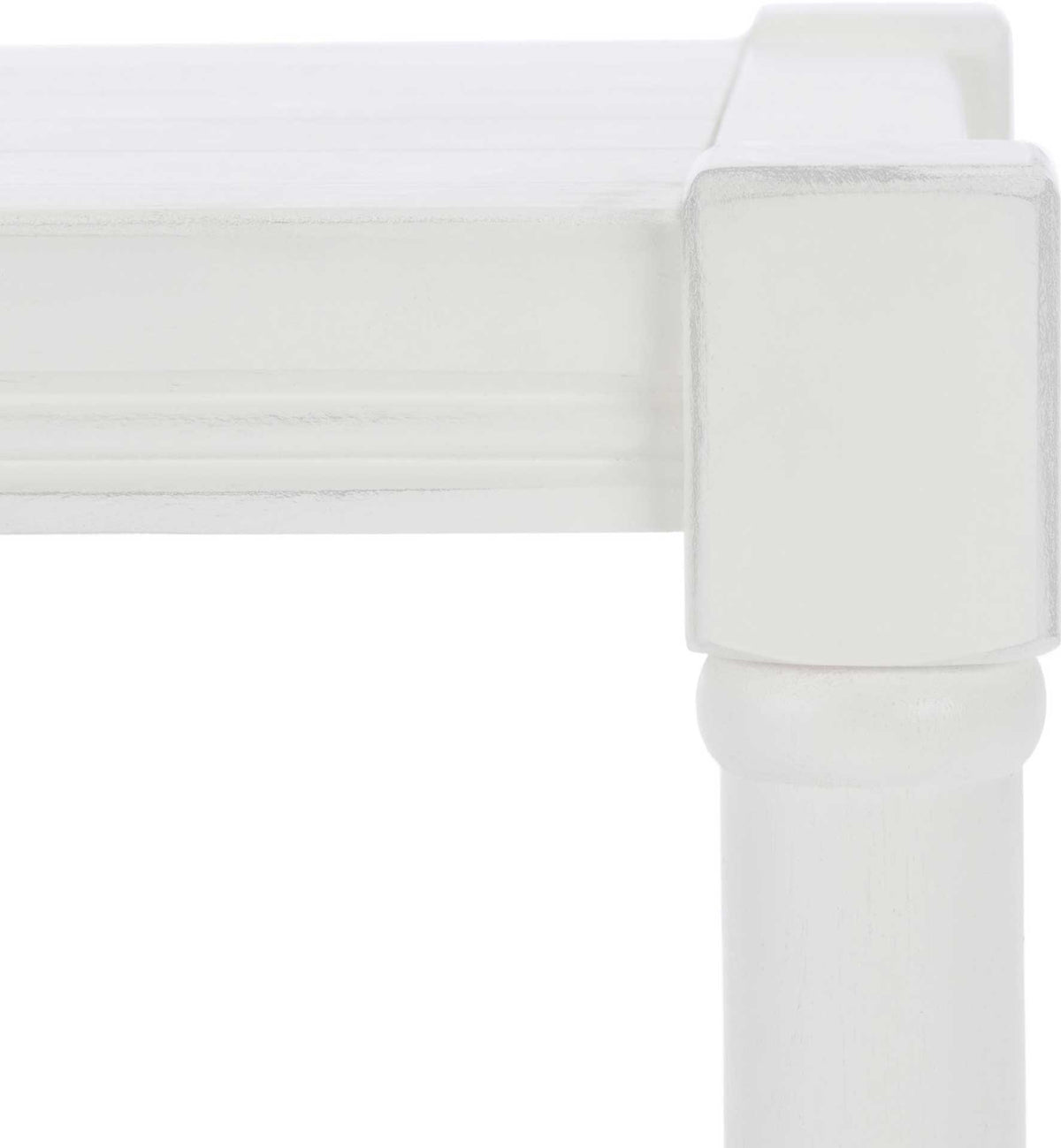 White table corner with distressed edging, a square post and molded apron trim