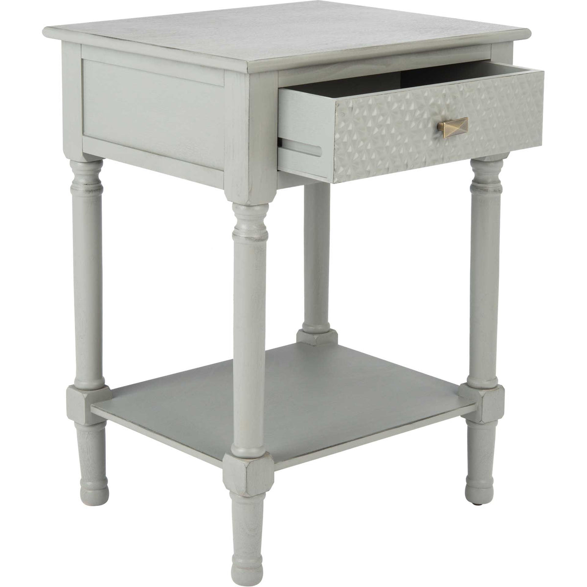 A patterned drawer opens to reveal storage beneath the distressed gray tabletop