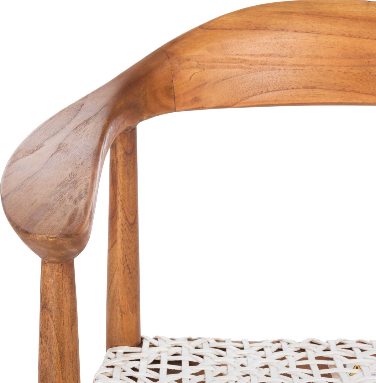 Rich wood grain follows the softly curved backrest above the white leather lattice.