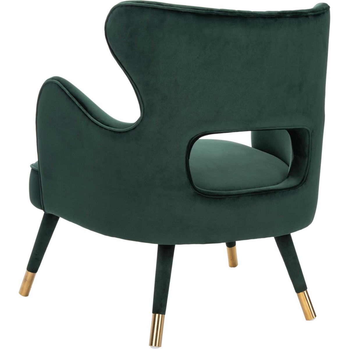 Sculpted forest green velvet upholstery frames a broad back cutout and gleaming gold leg caps