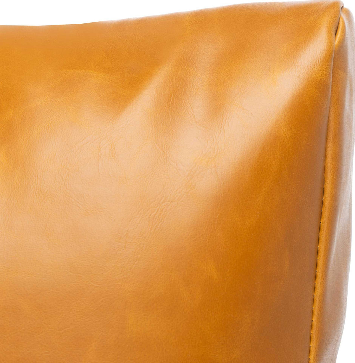 Subtle grain and a soft sheen enrich the smooth caramel vegan leather back cushion.