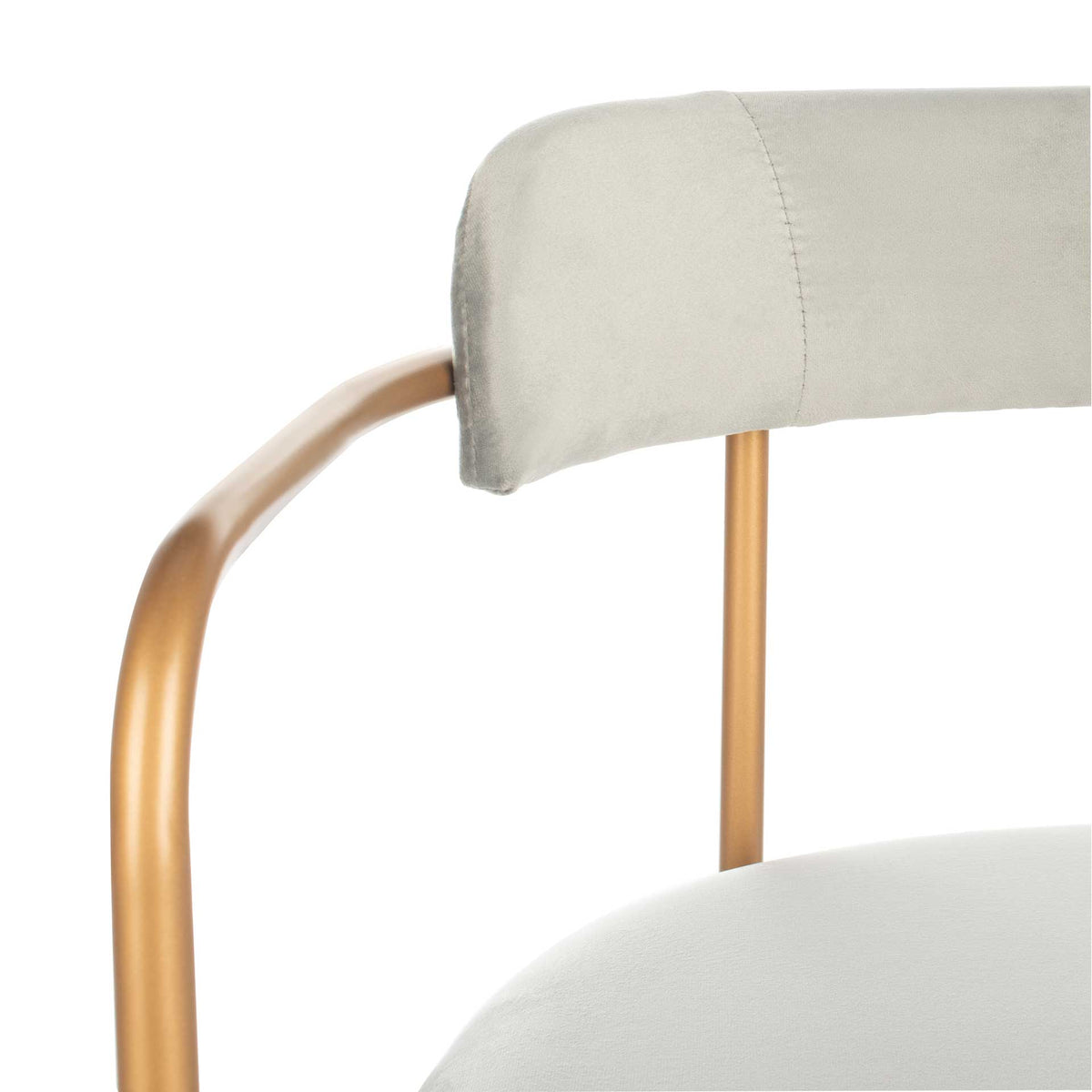 Stitched gray velvet padding meets a smooth gold arm and slender metal support