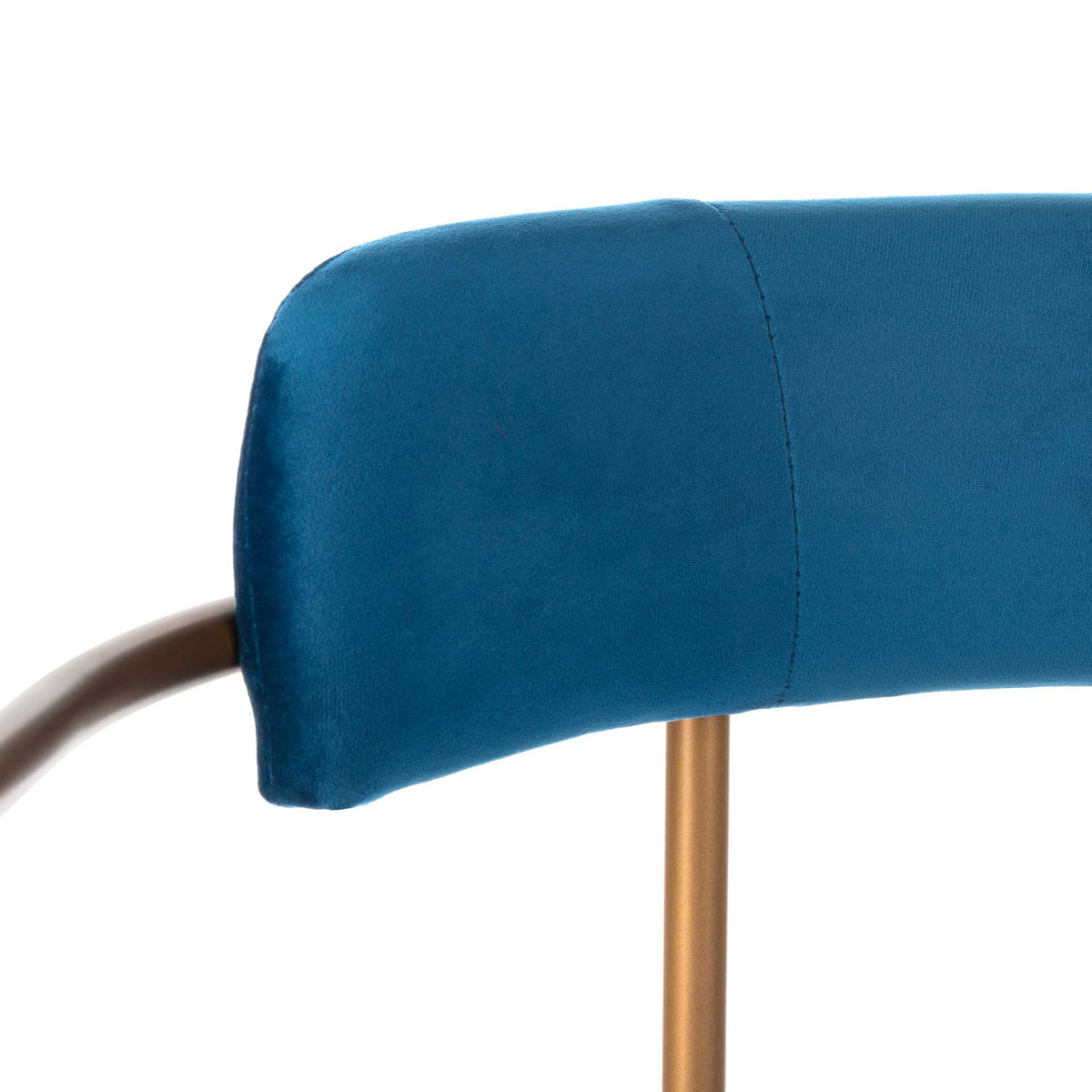 Tailored seams trace the plush navy velvet backrest above a slender gold support