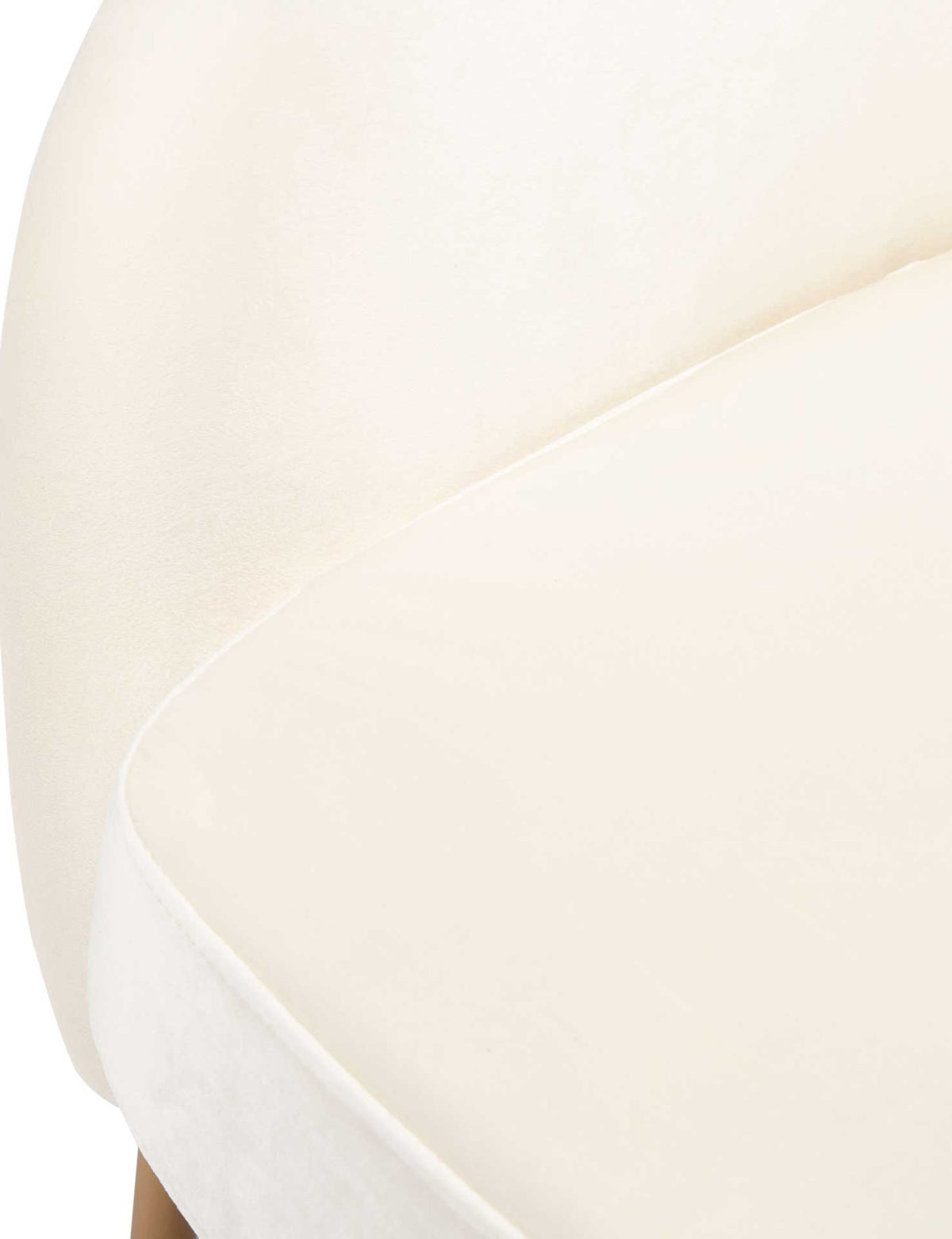 A thick cream seat cushion nestles against the upholstered shell for plush comfort.