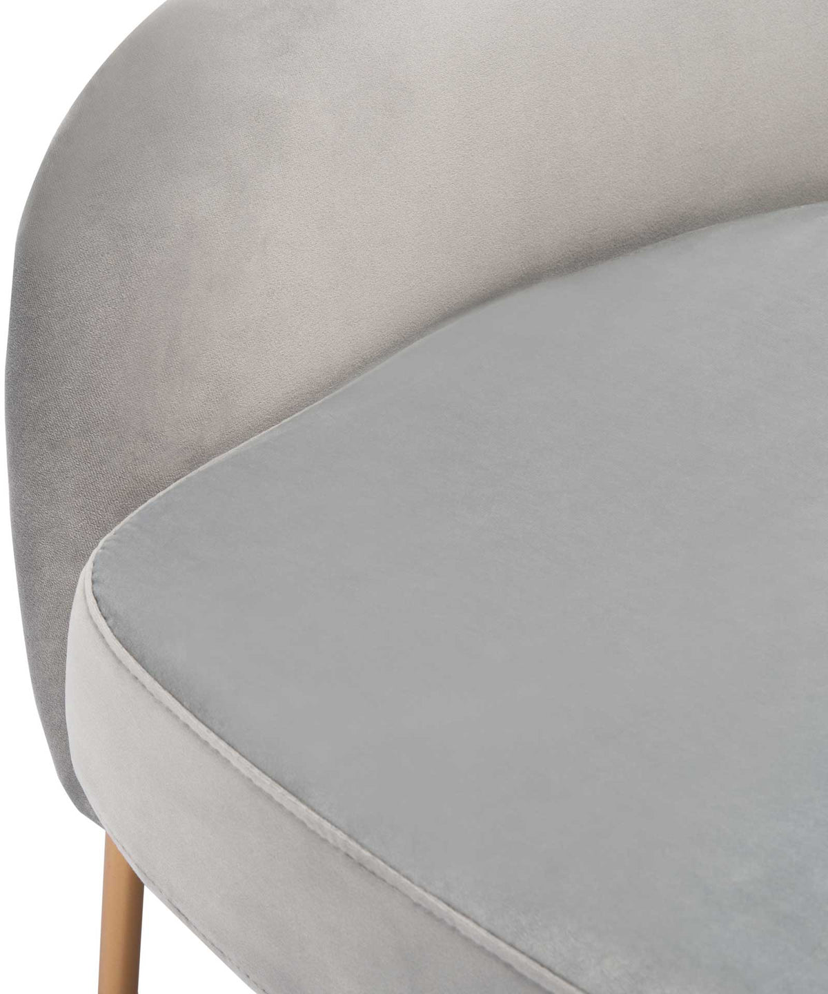 A generously padded gray seat cushion tucks neatly into the curved velvet shell.