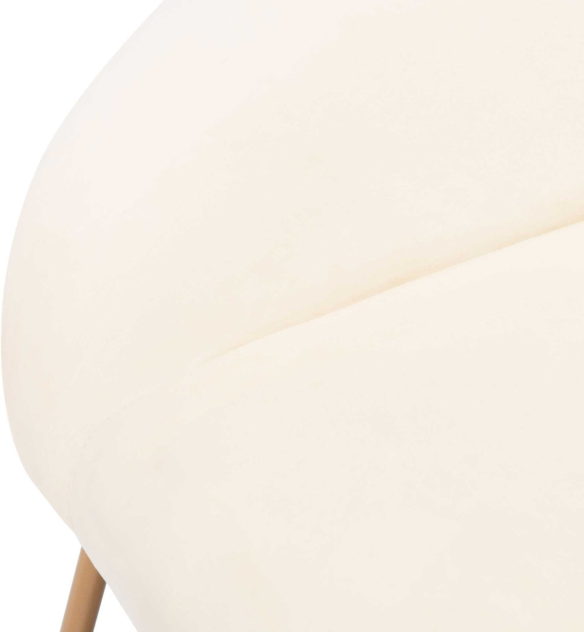 Cream velvet upholstery meets the padded seat along a subtle seam