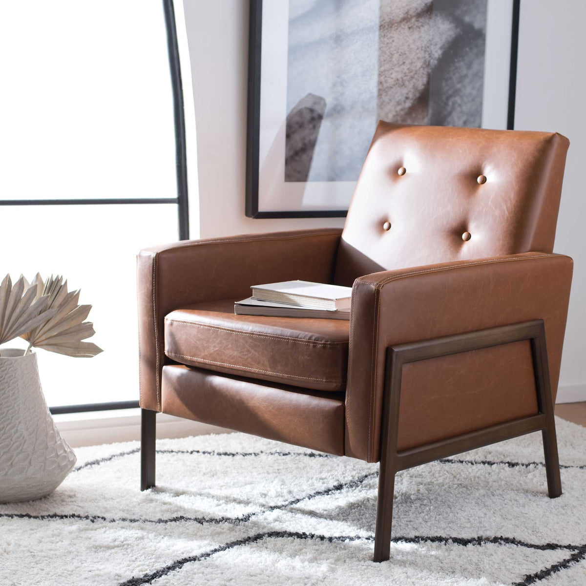 Caramel-brown vegan leather and a streamlined open frame warm up a relaxed living area