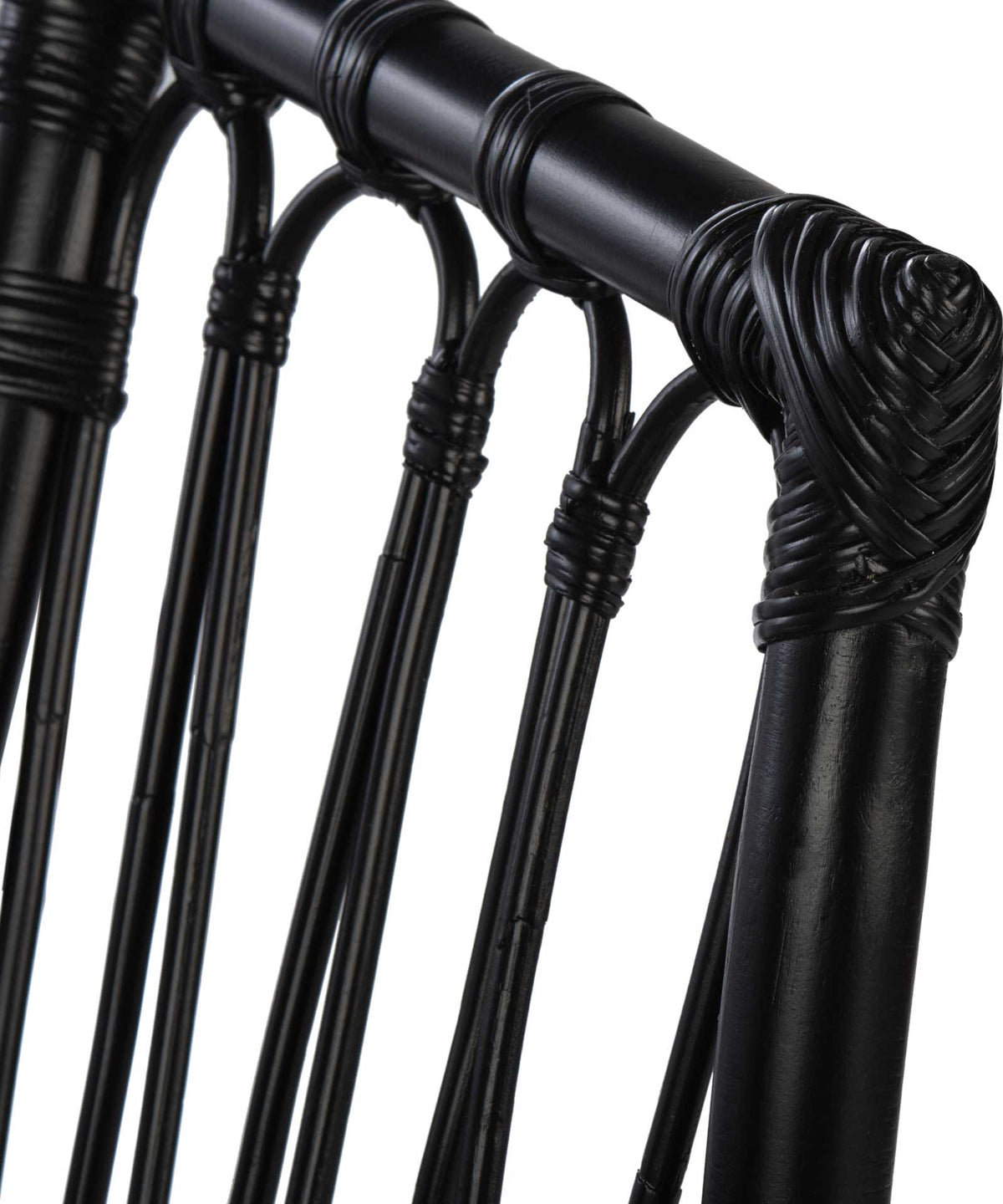 Tightly wrapped bindings secure black rattan spindles to a rounded rail