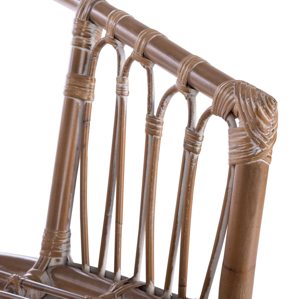 Wrapped rattan joints and slim spindles reveal the chair's weathered gray-whitewashed finish