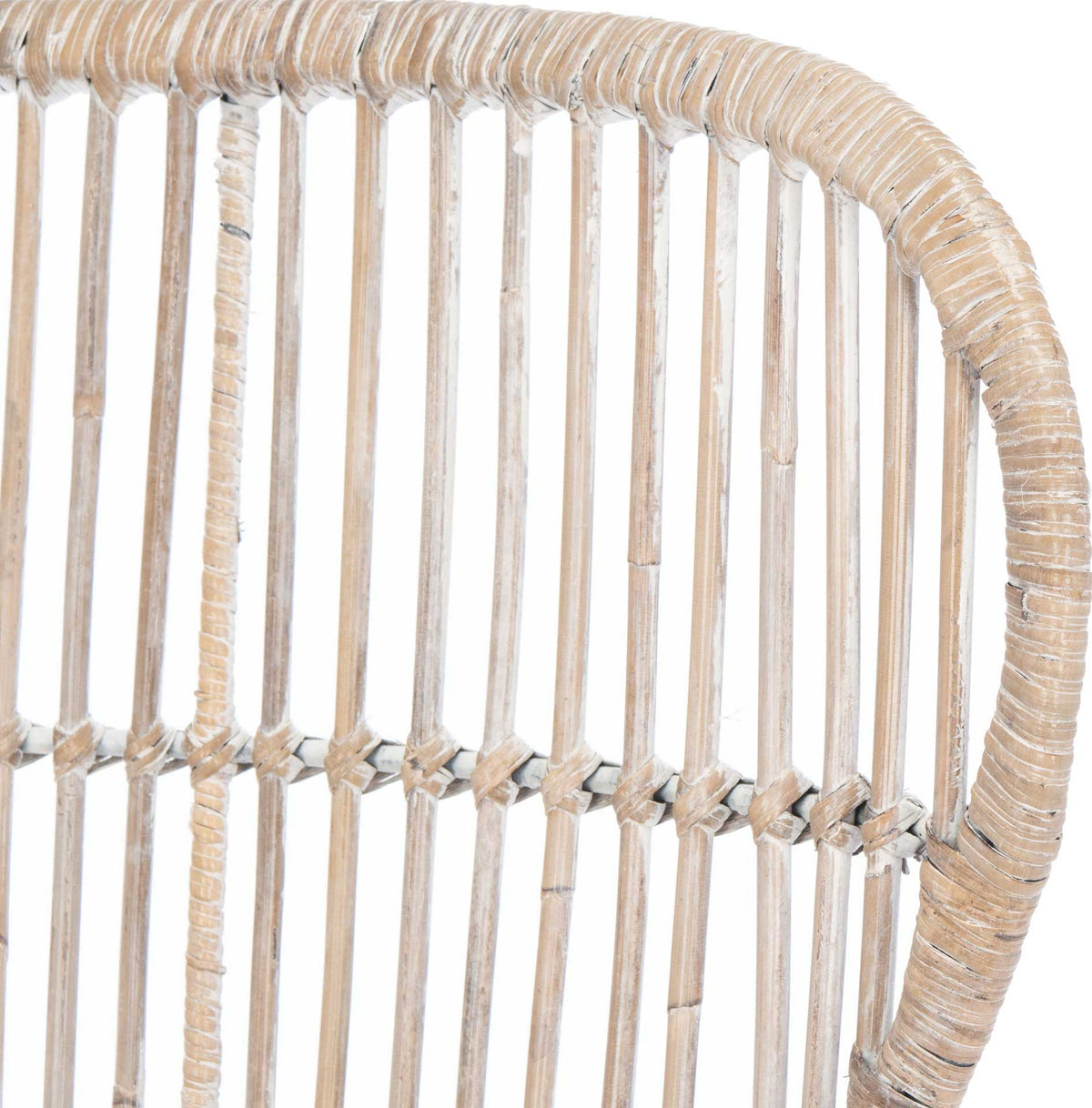 Pale rattan wraps the curved backrest rim, with slender spindles secured by woven bindings
