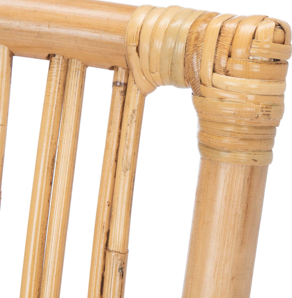 A wrapped rattan joint highlights the chair's handcrafted texture and natural finish