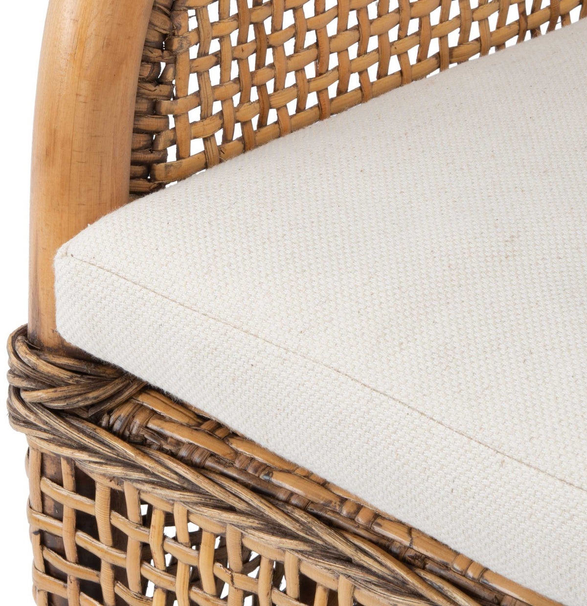A white seat cushion rests above wrapped rattan trim and a honey-brown woven base.