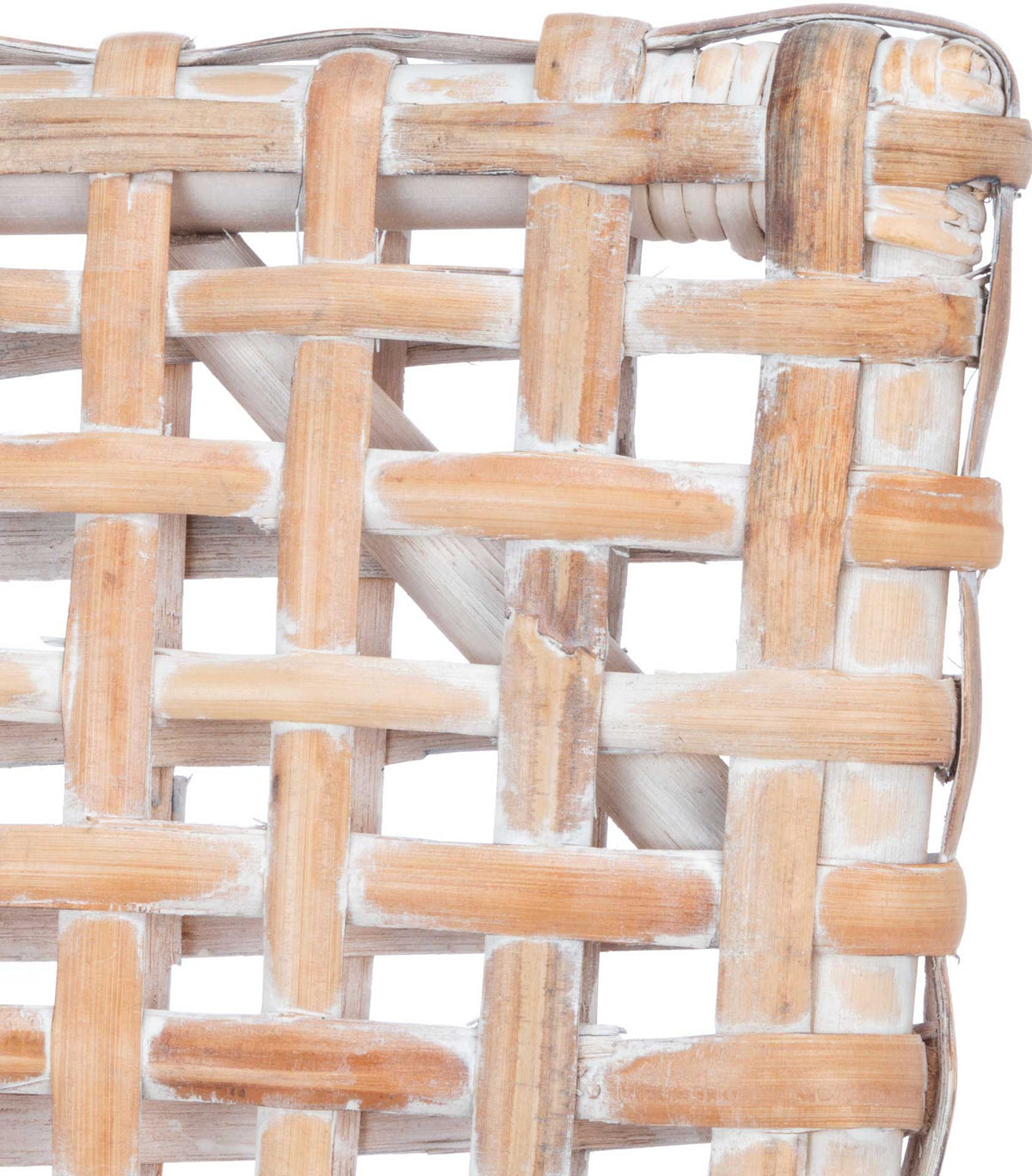 Interlaced whitewashed rattan reveals the chair's rounded edge and natural woven texture.