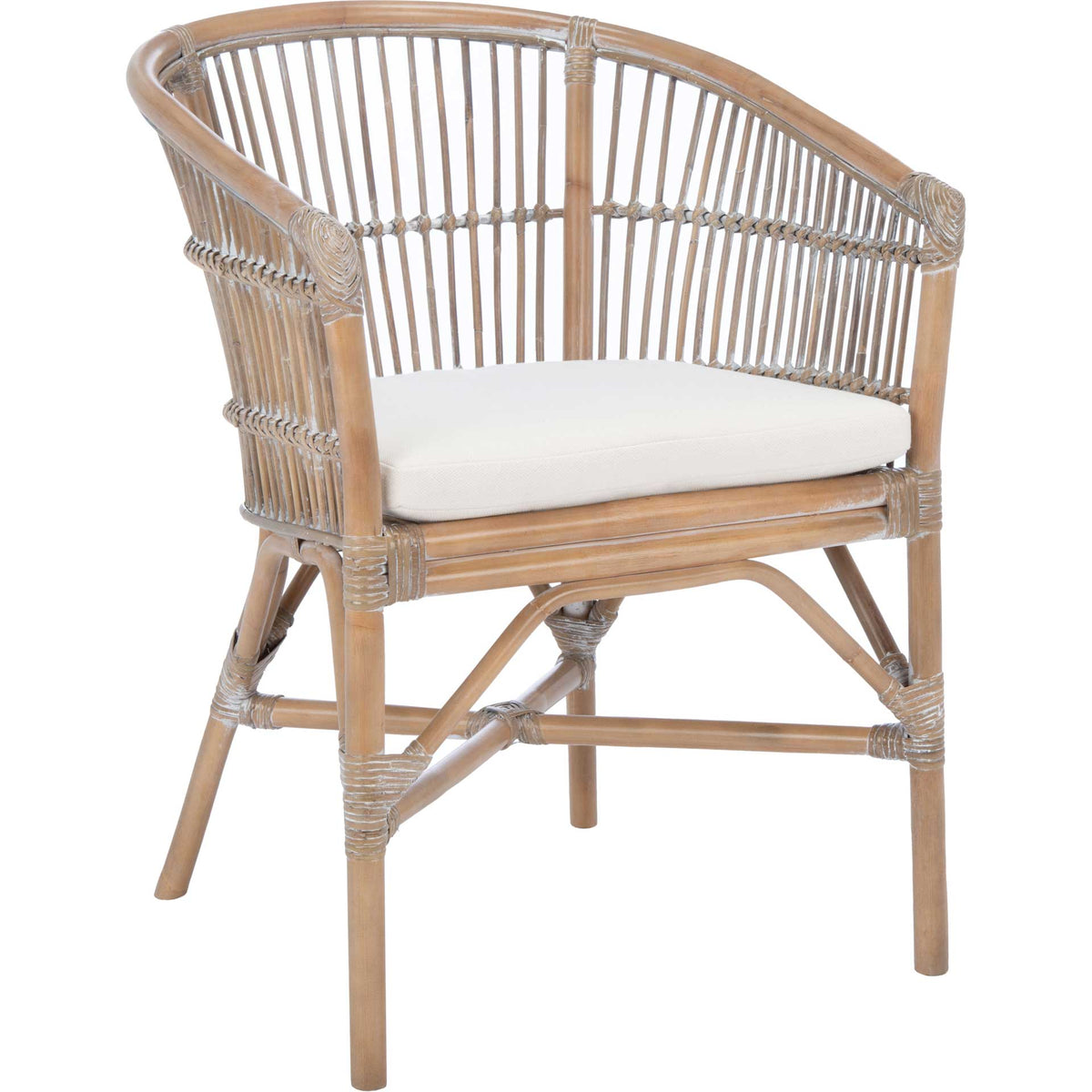 Gray-whitewashed rattan curves around a white cushioned seat above sculptural cross-braced legs. || ACH6516B || front_angle_studio