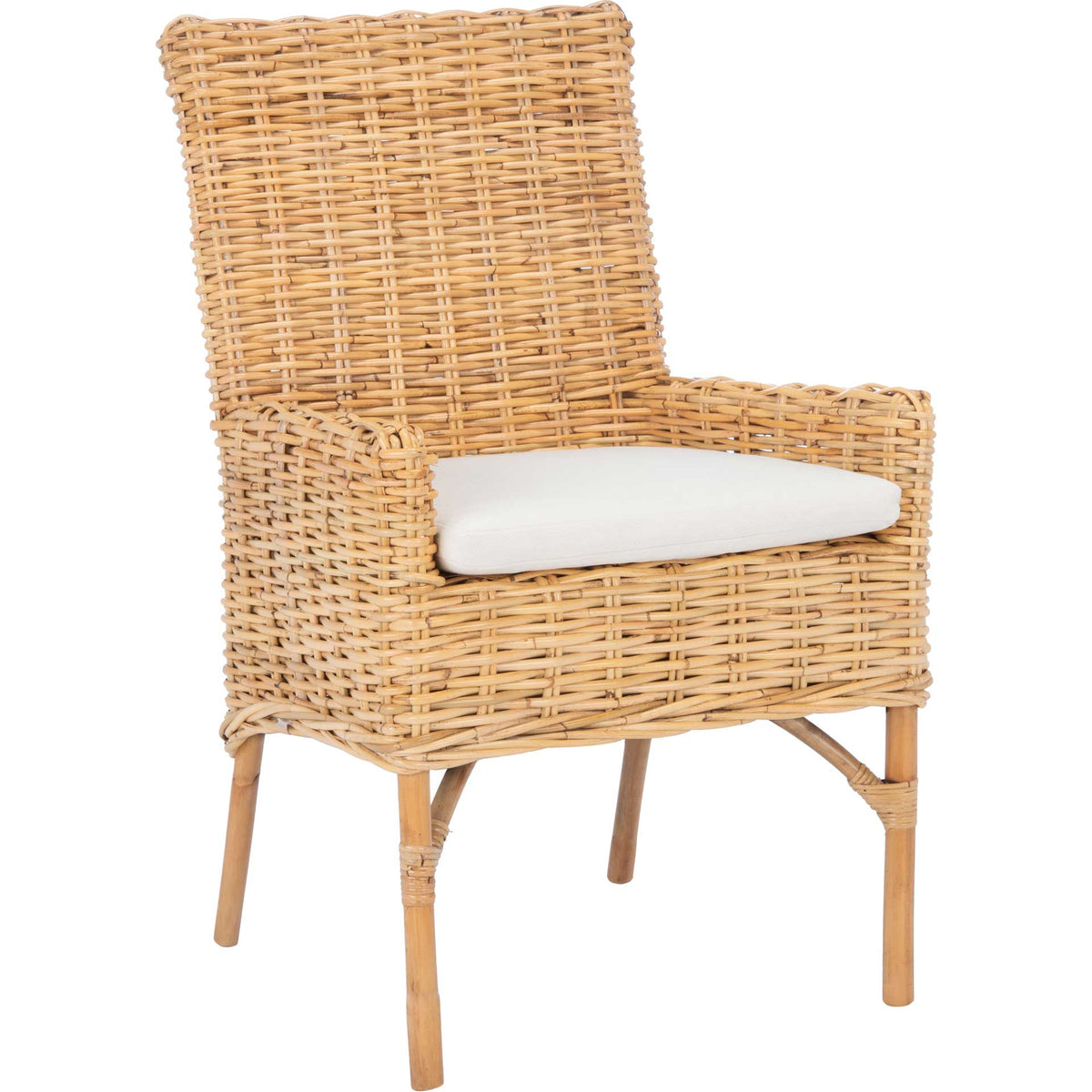 Warm natural rattan frames a tall woven back, supportive arms, and a crisp white cushion. || ACH6518B || front_angle_studio