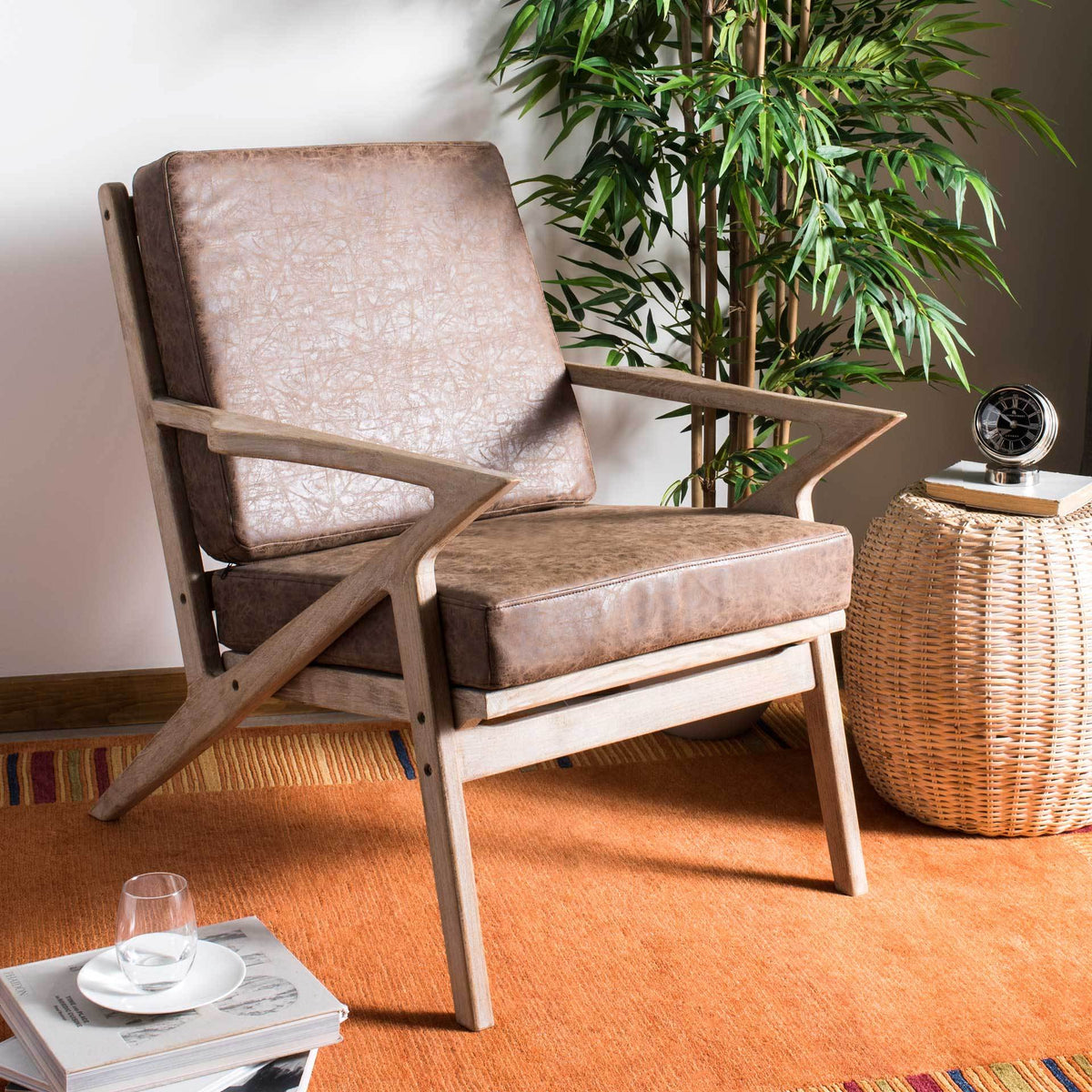 Warm brown cushions and angular wood arms bring inviting texture to a relaxed living space.