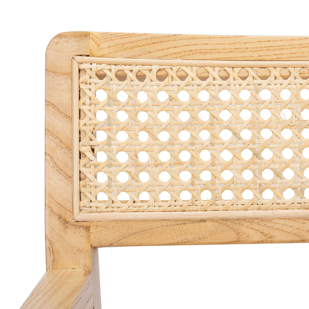 Intricate cane lattice meets grained natural wood along the chair's curved backrest.