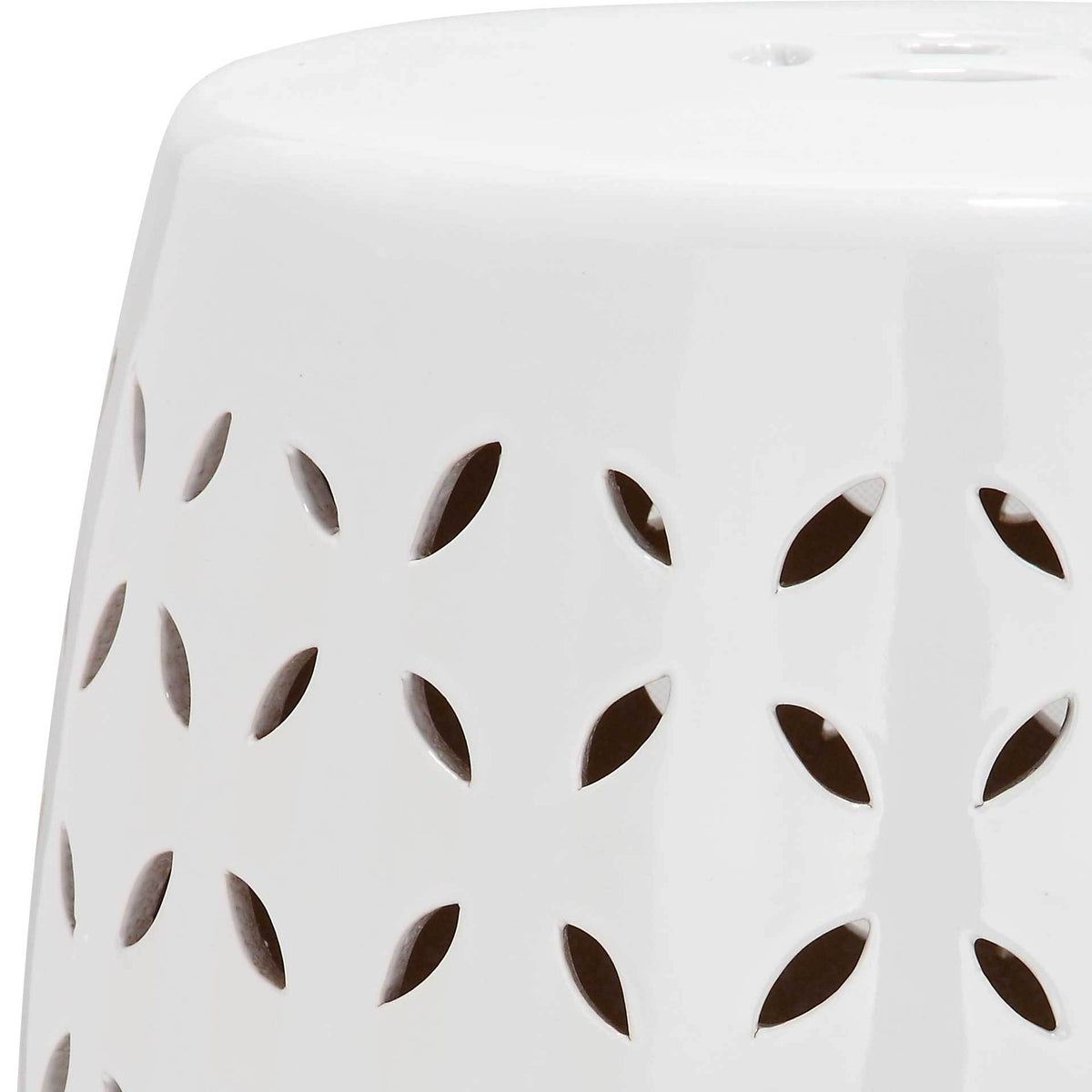 White glazed ceramic and delicate petal openings lend the stool an airy look