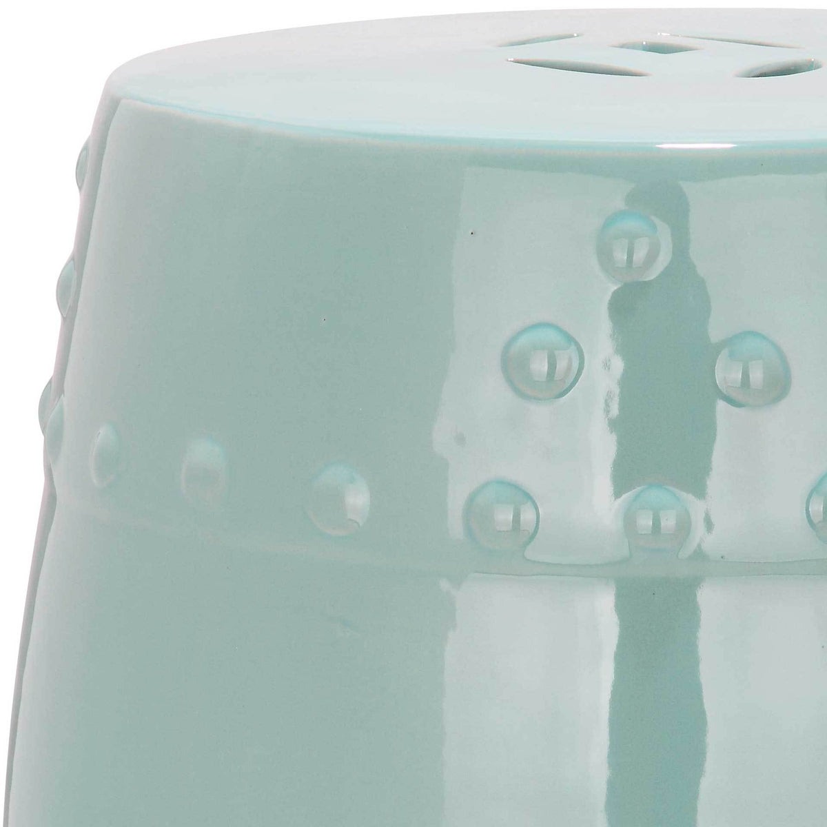 Soft aqua glaze lends a fresh finish to the rounded top and dimensional dot detailing.