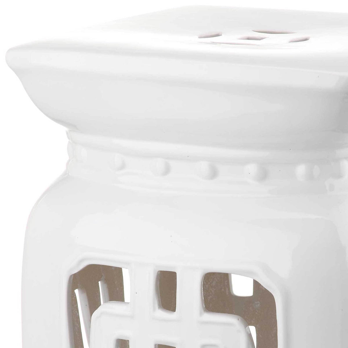 Smooth antique white glaze highlights the beaded trim, curved shoulder, and geometric openwork