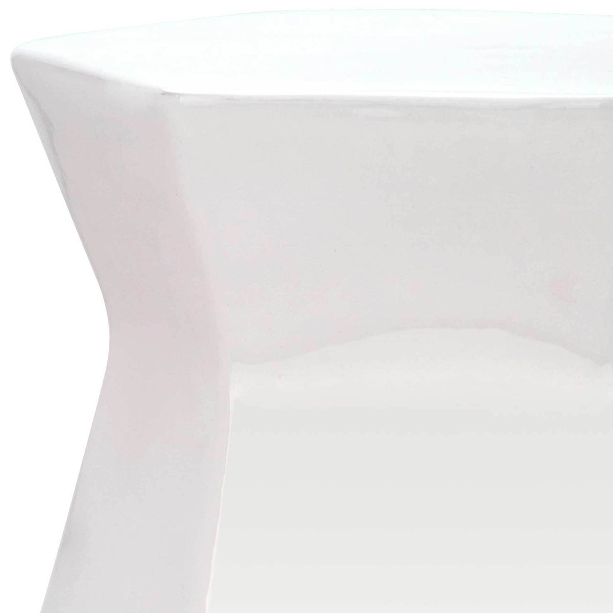 A soft cream glaze adds warmth to the flared rim and inward-curving ceramic facets.