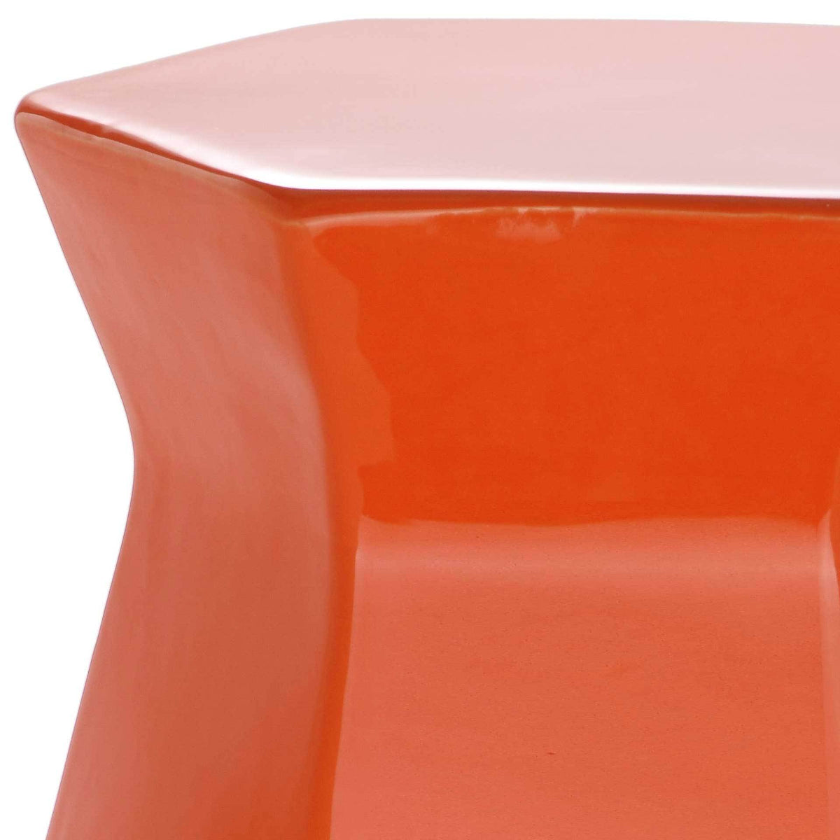 Glossy orange glaze highlights the flared rim and smooth, sculpted ceramic surfaces.