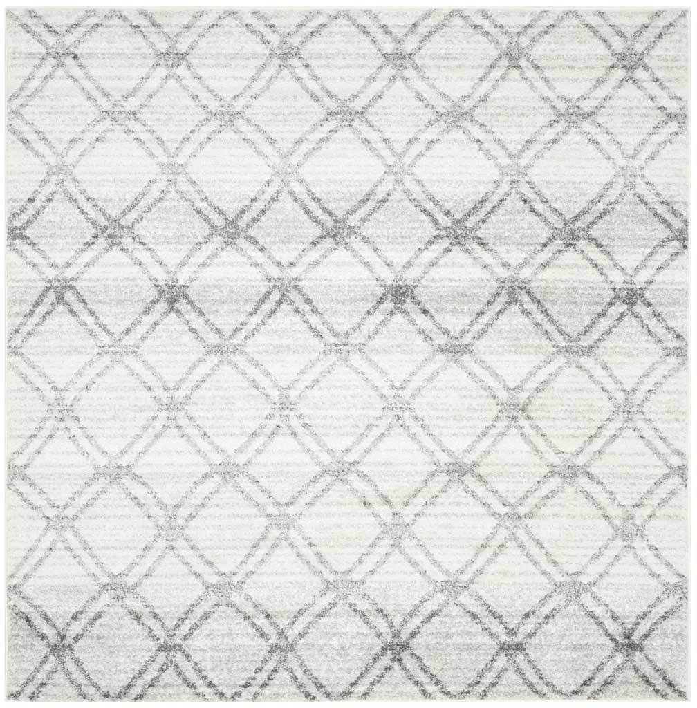 Square silver rug with a charcoal diamond trellis and subtle distressed shading