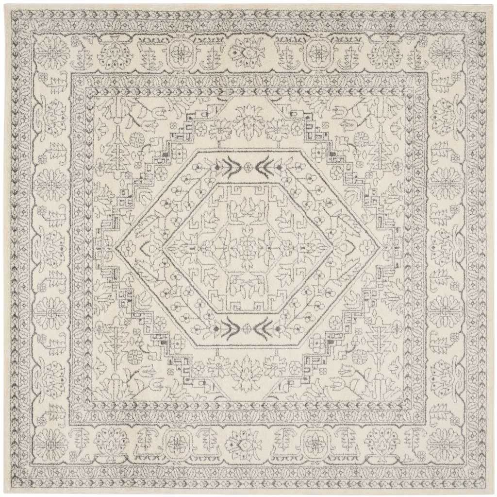 Square ivory and silver rug centers an ornate hexagonal medallion within floral borders.