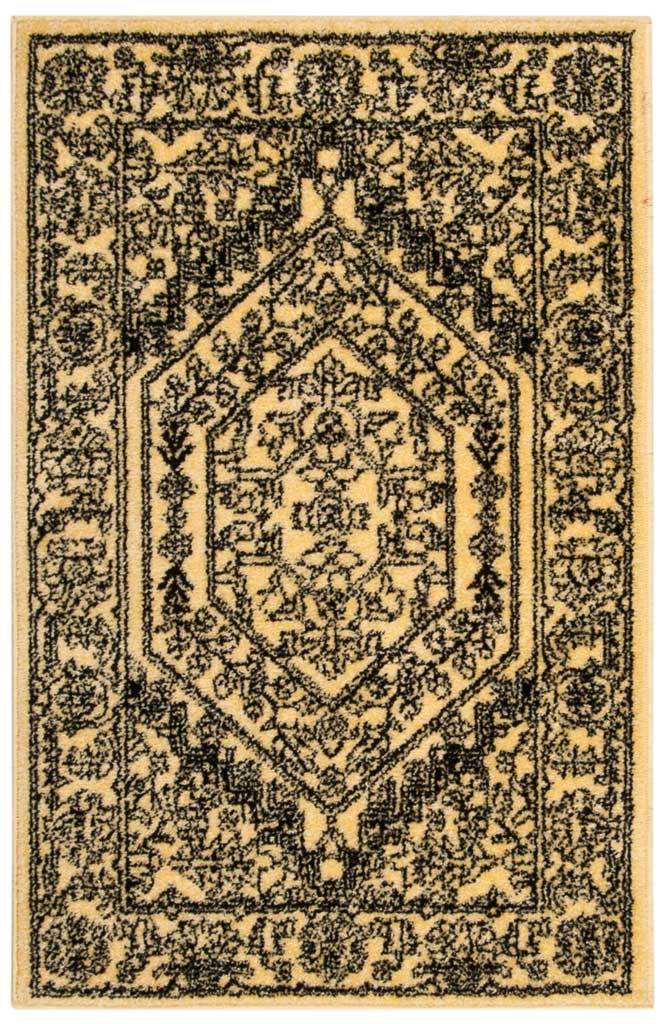 Gold and black area rug with a bold hexagonal medallion and ornate floral border. || ADR108H-8 || top_studio