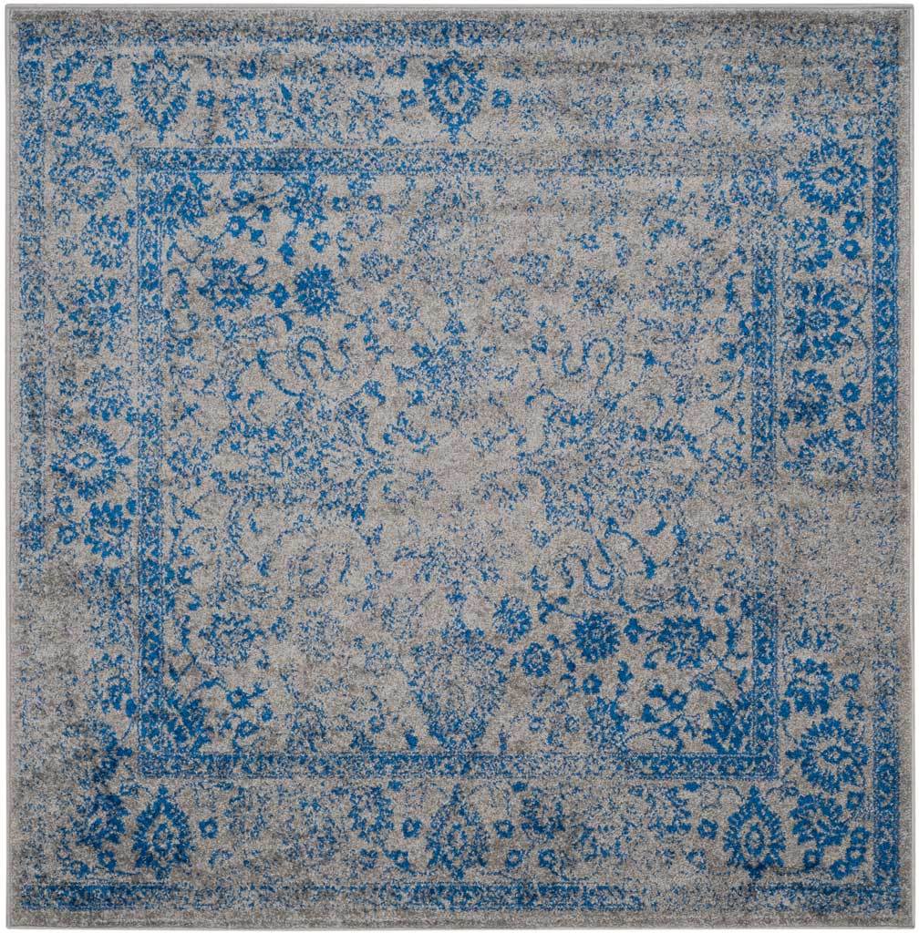 Gray and blue mingle across this square rug's worn floral medallion and border.