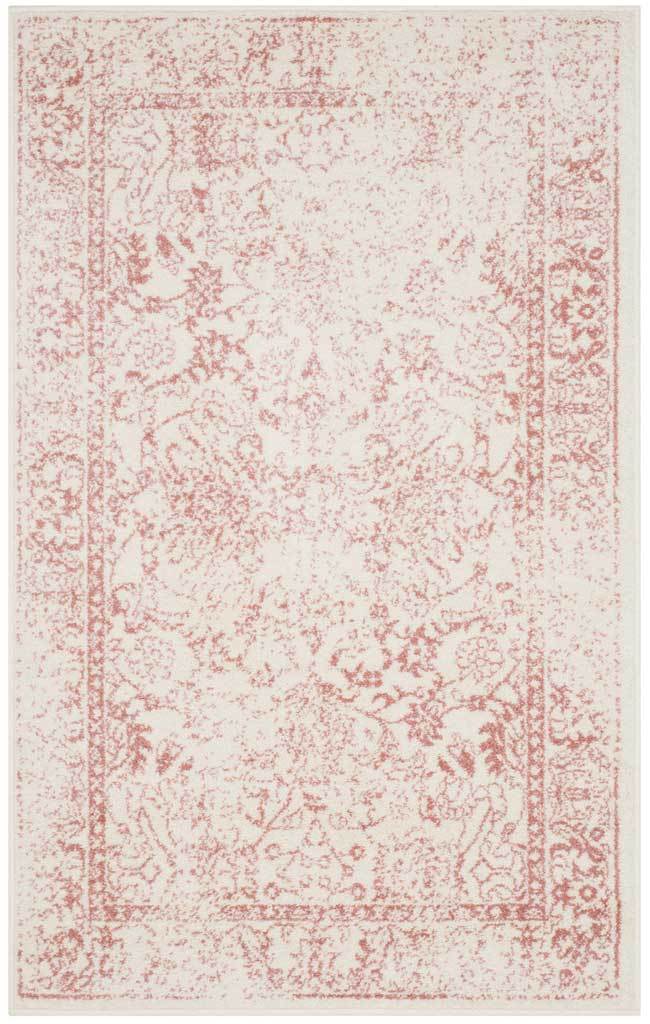 Rose floral vines and a gently faded ivory field dress this small area rug.