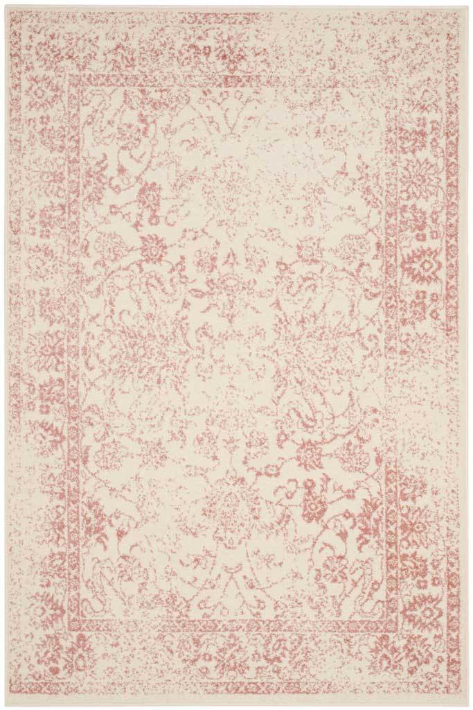 An ivory rug features weathered rose botanicals within a delicate floral border.