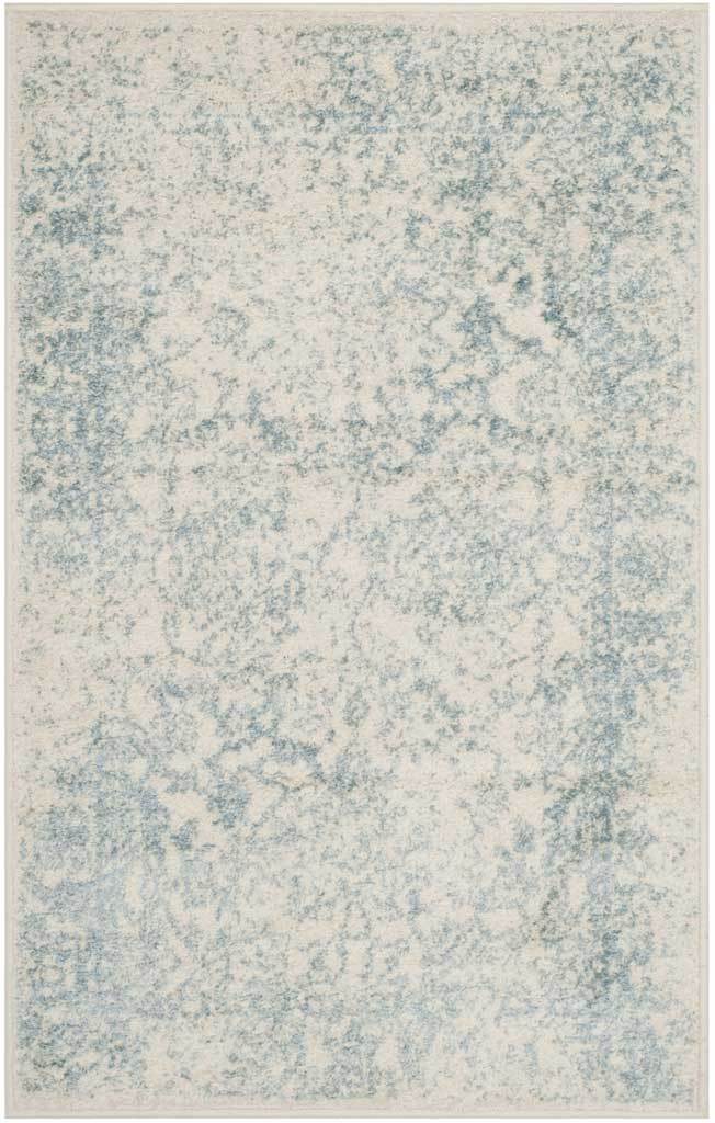 Faded slate flowers dust a compact ivory rug for gentle contrast.