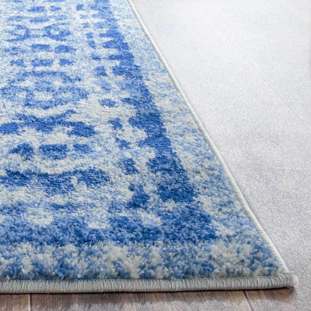 Blue and silver pile meets neatly bound edges for a soft, textured finish