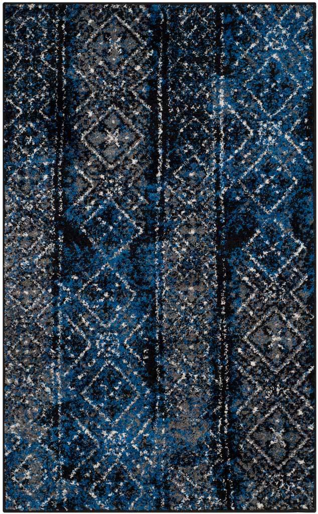 Small blue and black rug features softened diamonds amid richly mottled color