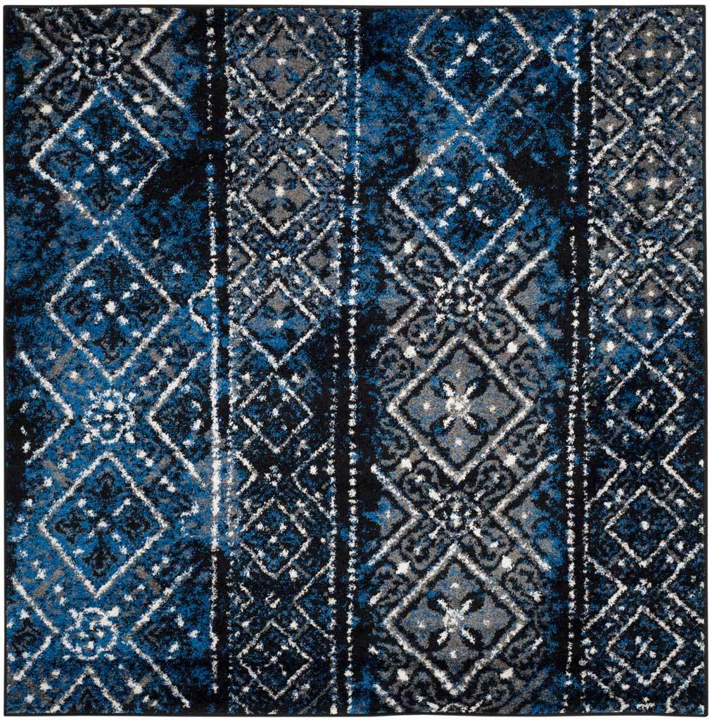 Deep blue and black rug layers ornate diamonds across distressed geometric bands || ADR111A-8 || top_studio