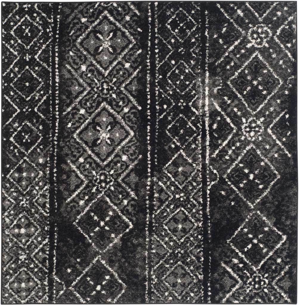 Square black and silver rug combines faded floral diamonds with narrow patterned stripes