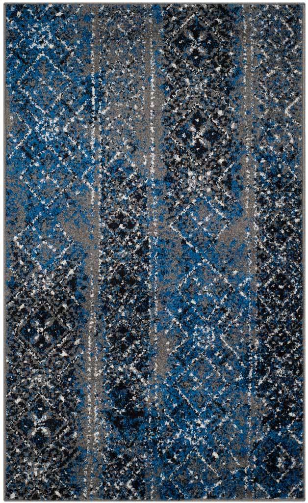 Small silver and blue rug mixes mottled bands with repeating dark diamond motifs