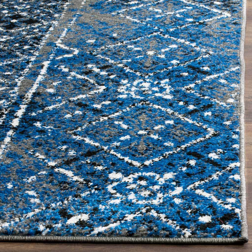 White-outlined diamonds stand out against rich cobalt pile and a finished edge