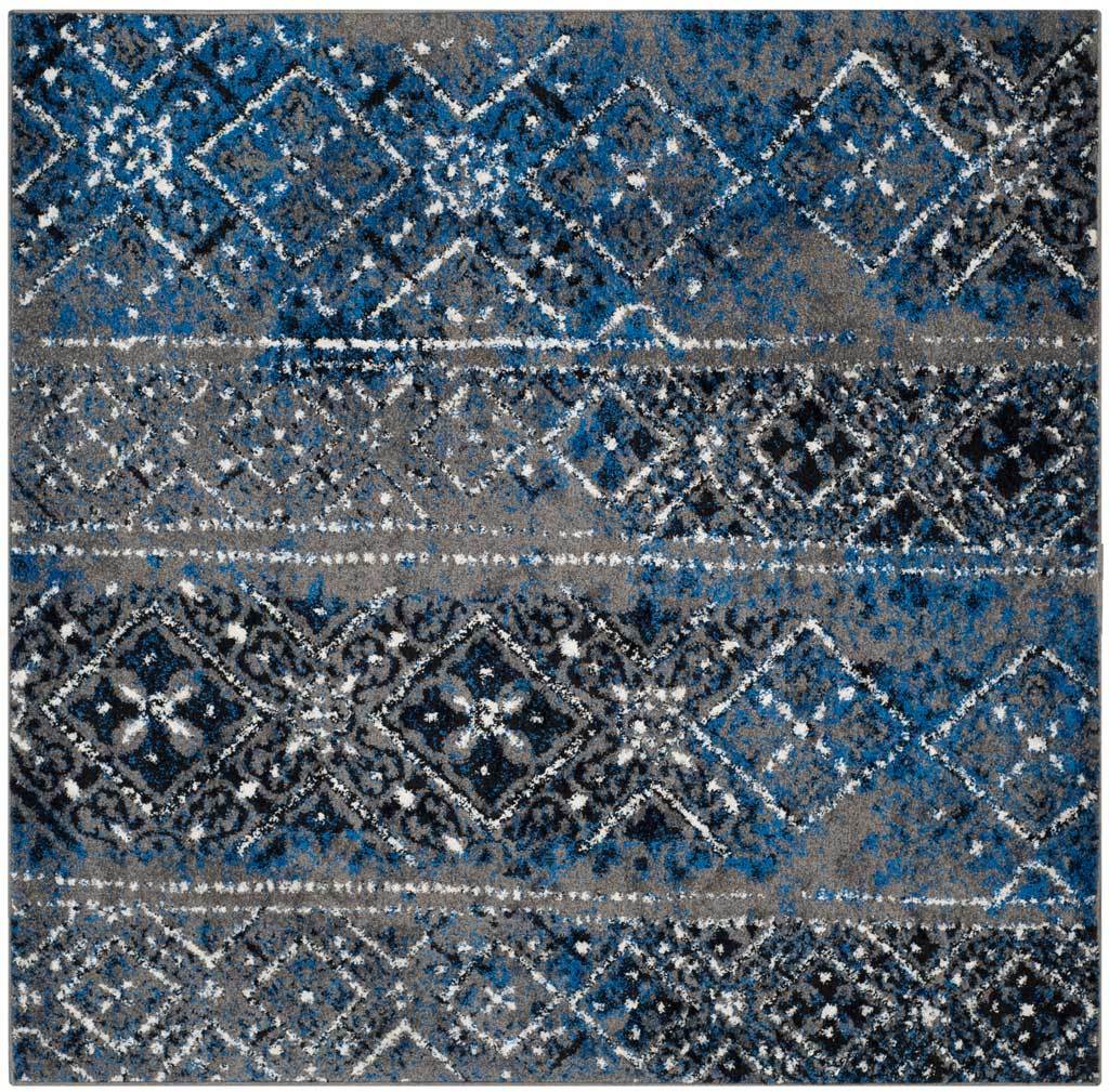 Silver, blue, and black diamonds form dramatic distressed bands across this area rug || ADR111G-8 || top_studio