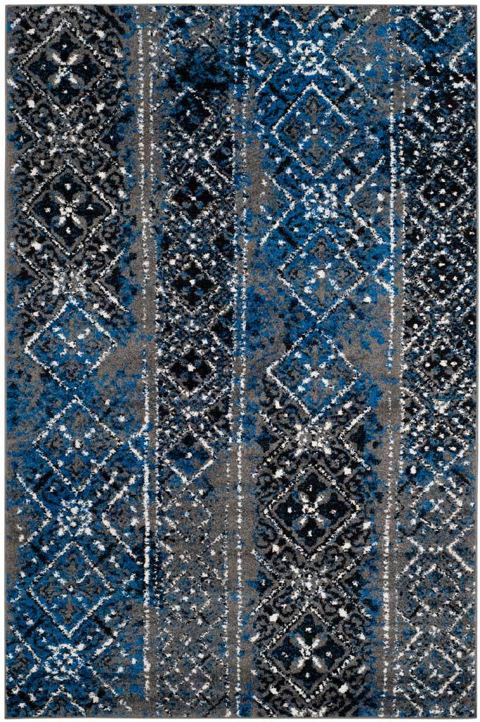 Blue and gray geometric bands punctuate the distressed silver ground of this rug