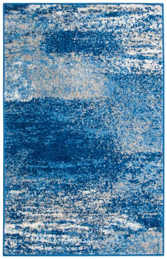 Silver and blue accent rug with saturated blue bands and a flecked, weathered texture
