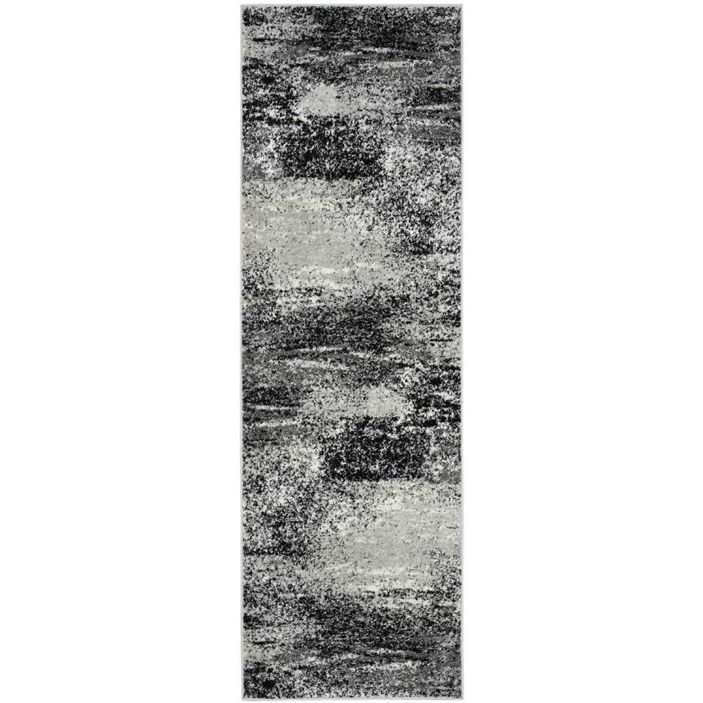 A silver and charcoal runner rug pairs dark, distressed bands with a bright mottled ground || ADR112G-28 || top_studio