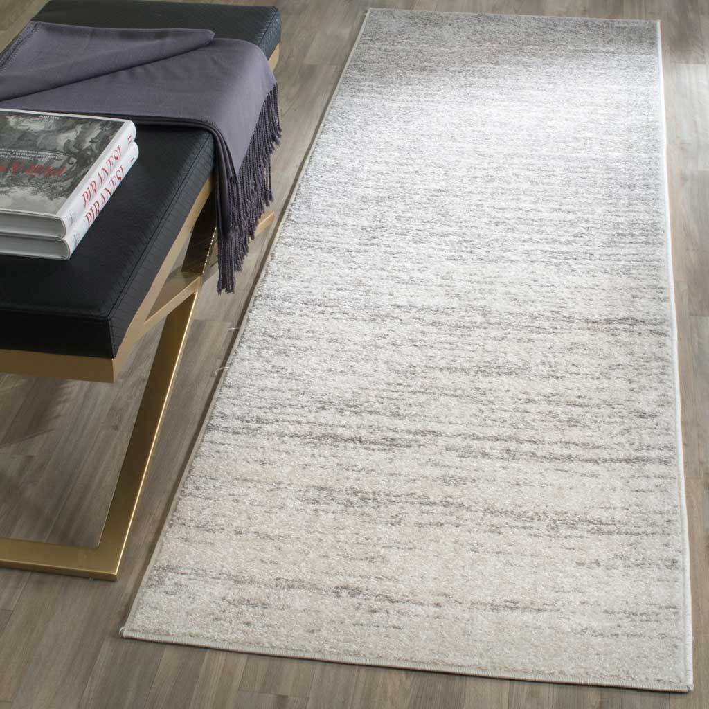 Ivory and silver runner rug brings a softly distressed fade and light texture to narrow spaces
